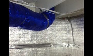 Inside new build with blue exposed duct work