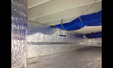 Inside new build with blue exposed duct work